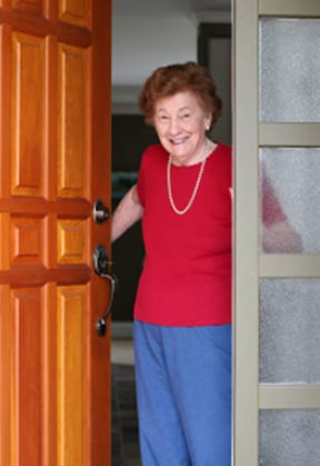 istock - lady at door istock - lady at door